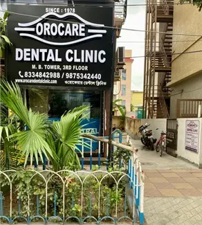 OroCare Dental Clinic signboard on the 3rd floor of M.B. Tower, Mukundapur, Kolkata